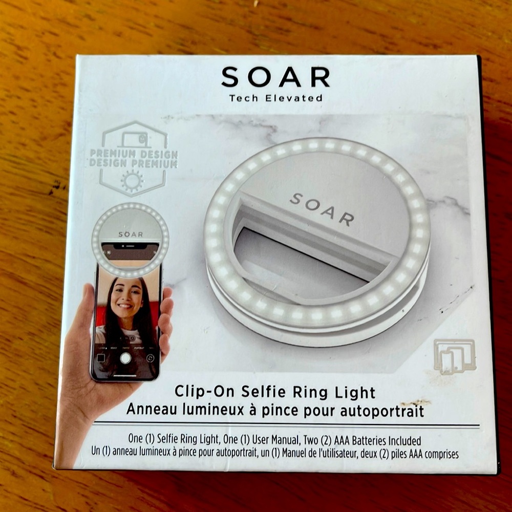 Brand new, unopened SOAR clip-on selfie ring light. Sells for $29.99